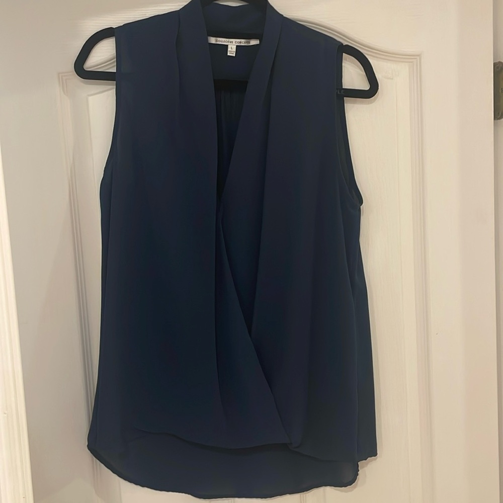 Navy sleeveless collective concepts blouse, size L